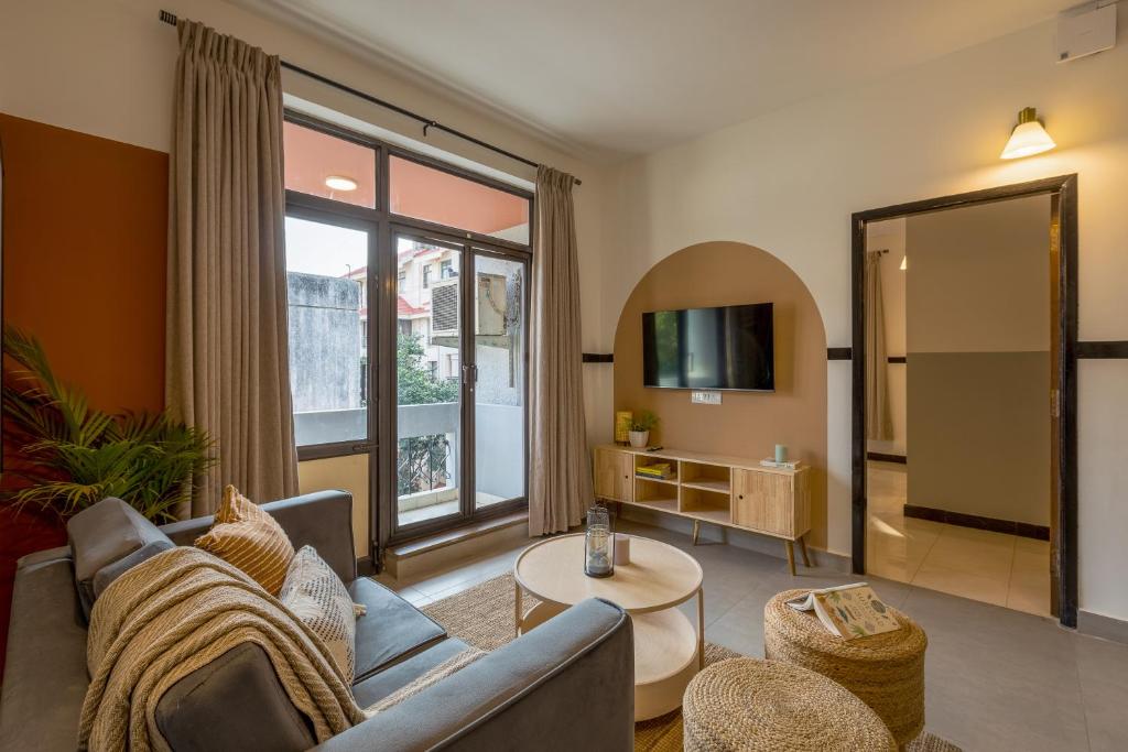 TV a/nebo společenská místnost v ubytování Olive Hotel Palace Road by Embassy Group
