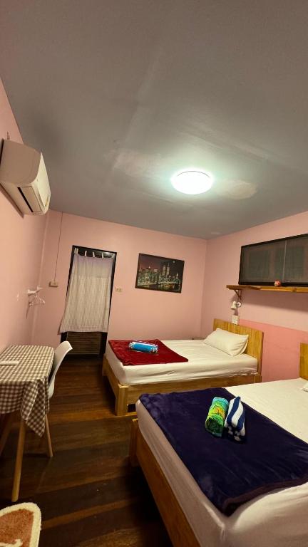 Postel nebo postele na pokoji v ubytování Let's Sea Hostel