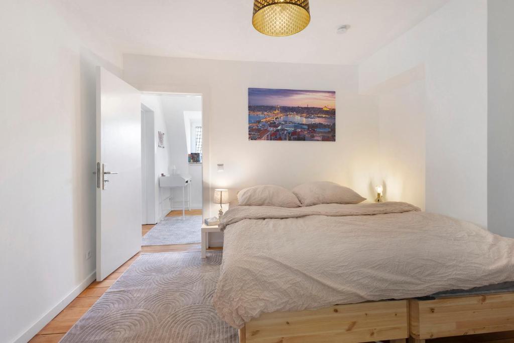 Postel nebo postele na pokoji v ubytování gp urban stay