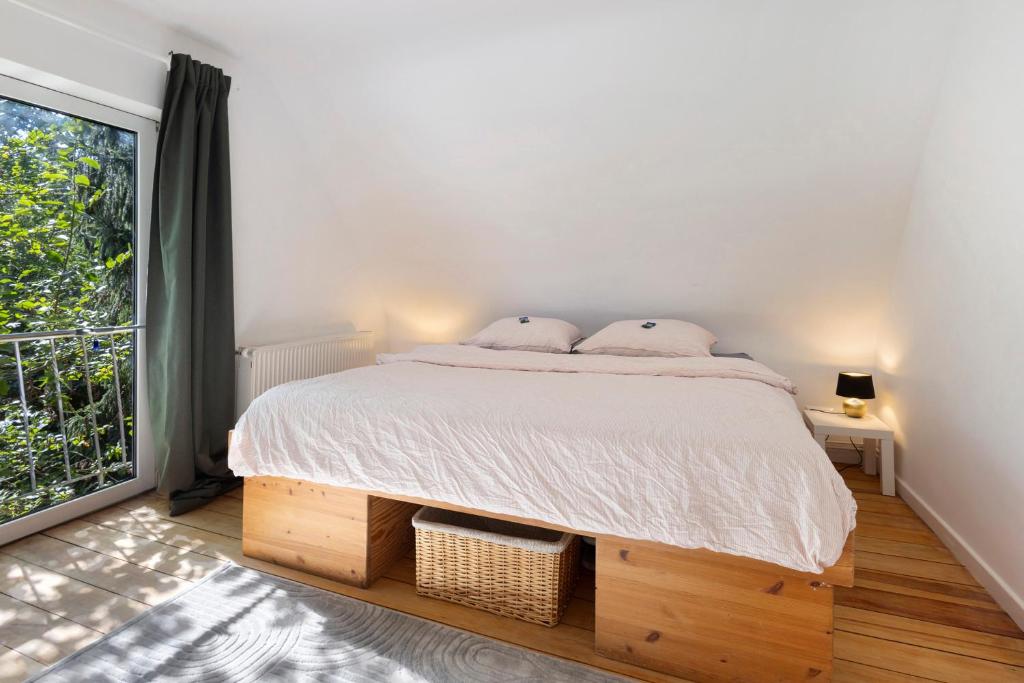 Postel nebo postele na pokoji v ubytování gp urban stay