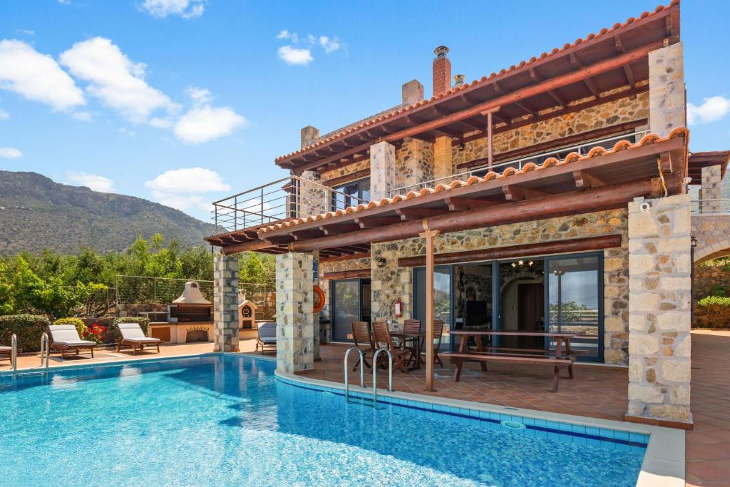 Πισίνα στο ή κοντά στο Kambos Horizon & Paradise Villas