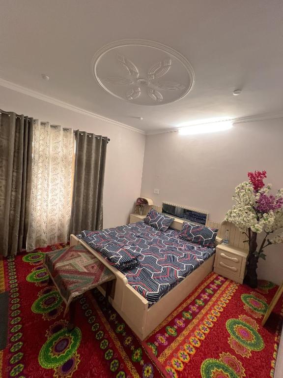 Postel nebo postele na pokoji v ubytování RocRidge Home stay
