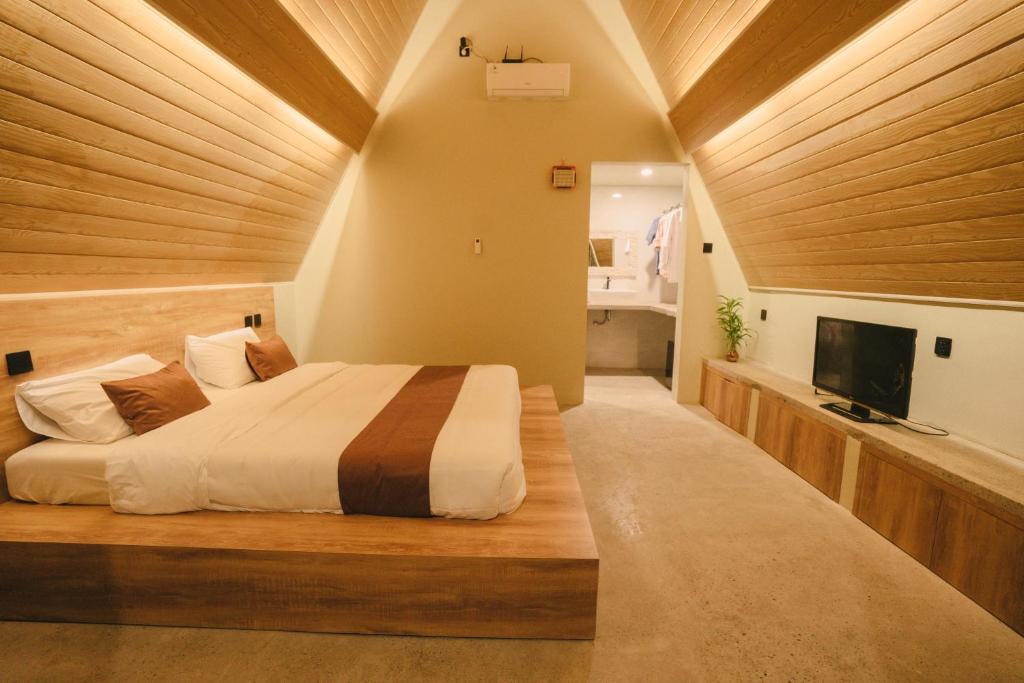 Postel nebo postele na pokoji v ubytování Maya Ocean Resort