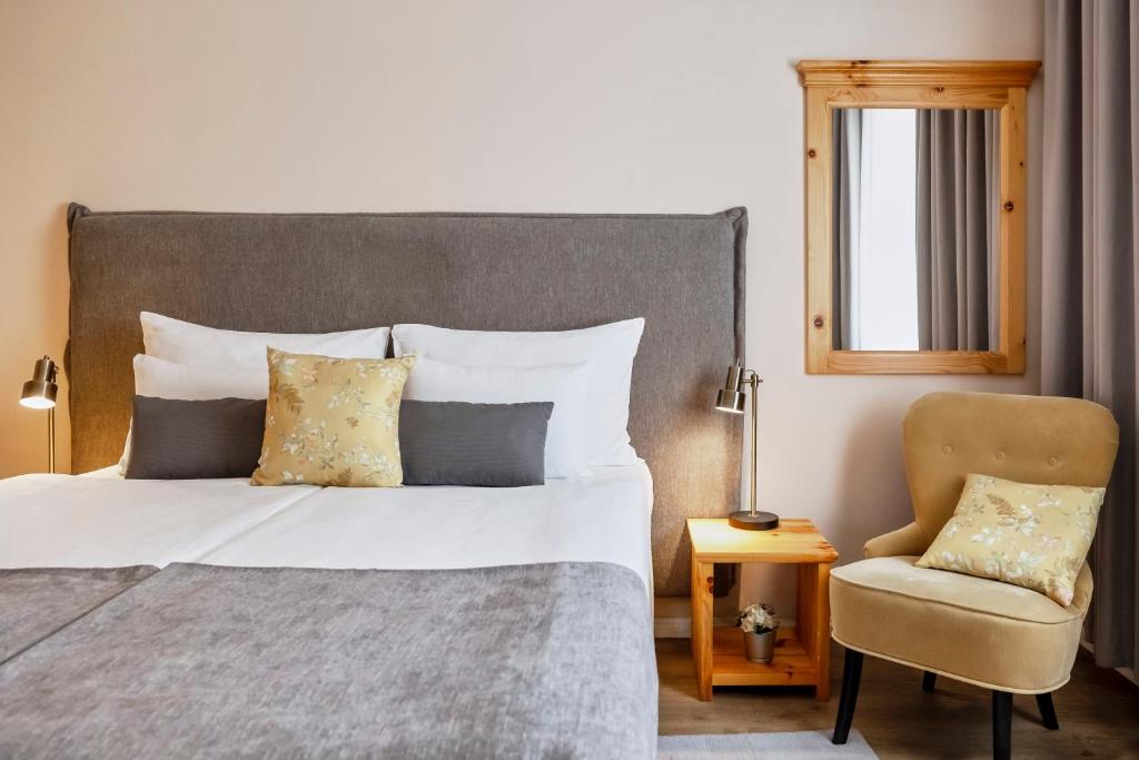 Postel nebo postele na pokoji v ubytování Hotel Kadoor