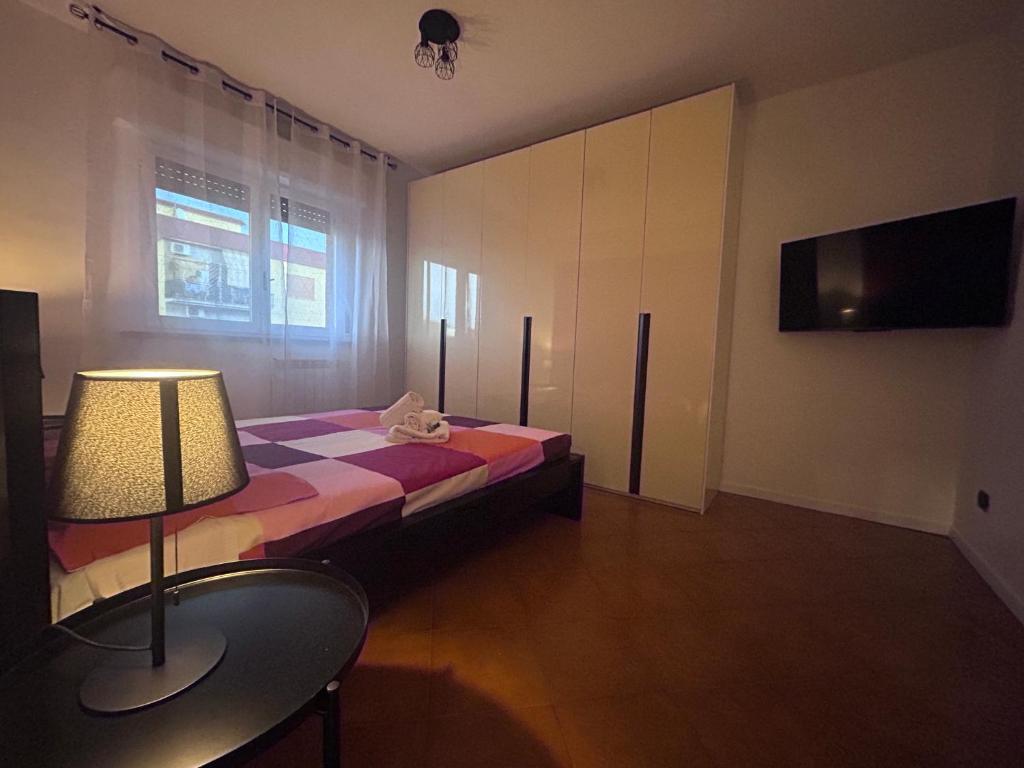 Postel nebo postele na pokoji v ubytování Il Ninfeo La Rustica Roma