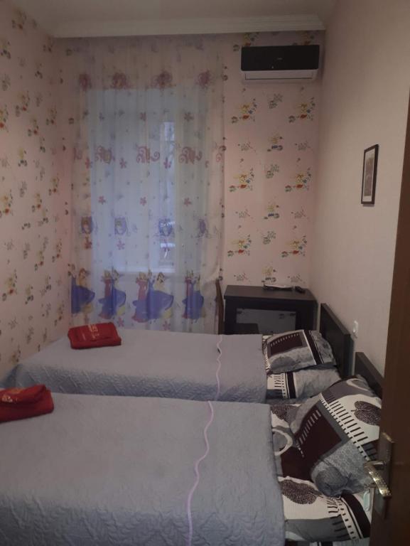 Postel nebo postele na pokoji v ubytování Fifth Element