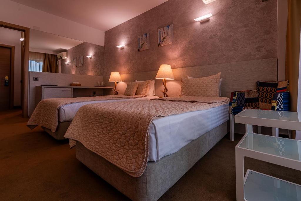 Postel nebo postele na pokoji v ubytování Alcor Beach Hotel