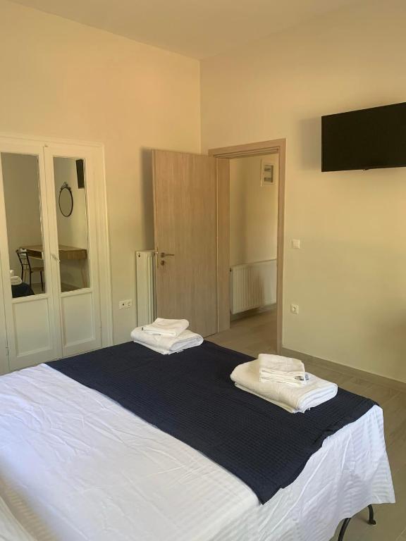 Voodi või voodid majutusasutuse Aeacus Serenity Apartment toas