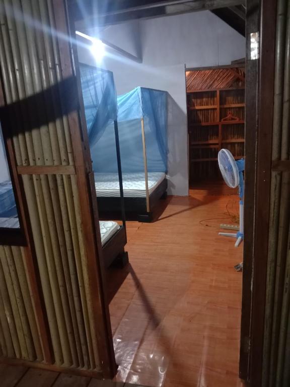 Postel nebo postele na pokoji v ubytování Amfriwen Homestay