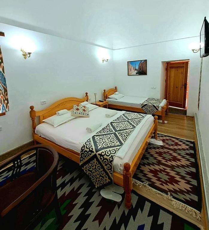 madrasah Polvon-Qori boutique hotel XIX century - Habitación Triple Clásica