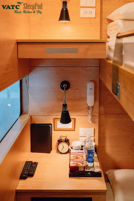 TV a/nebo společenská místnost v ubytování VATC Sleep Pod Terminal 2