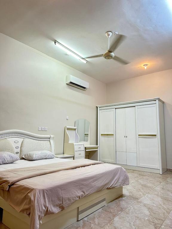 Postel nebo postele na pokoji v ubytování بيت بديه Bidiya house