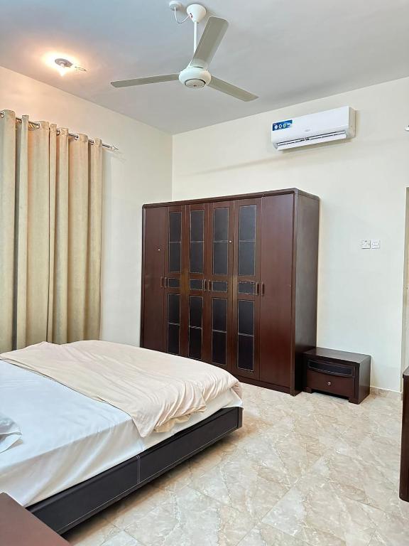 Postel nebo postele na pokoji v ubytování بيت بديه Bidiya house