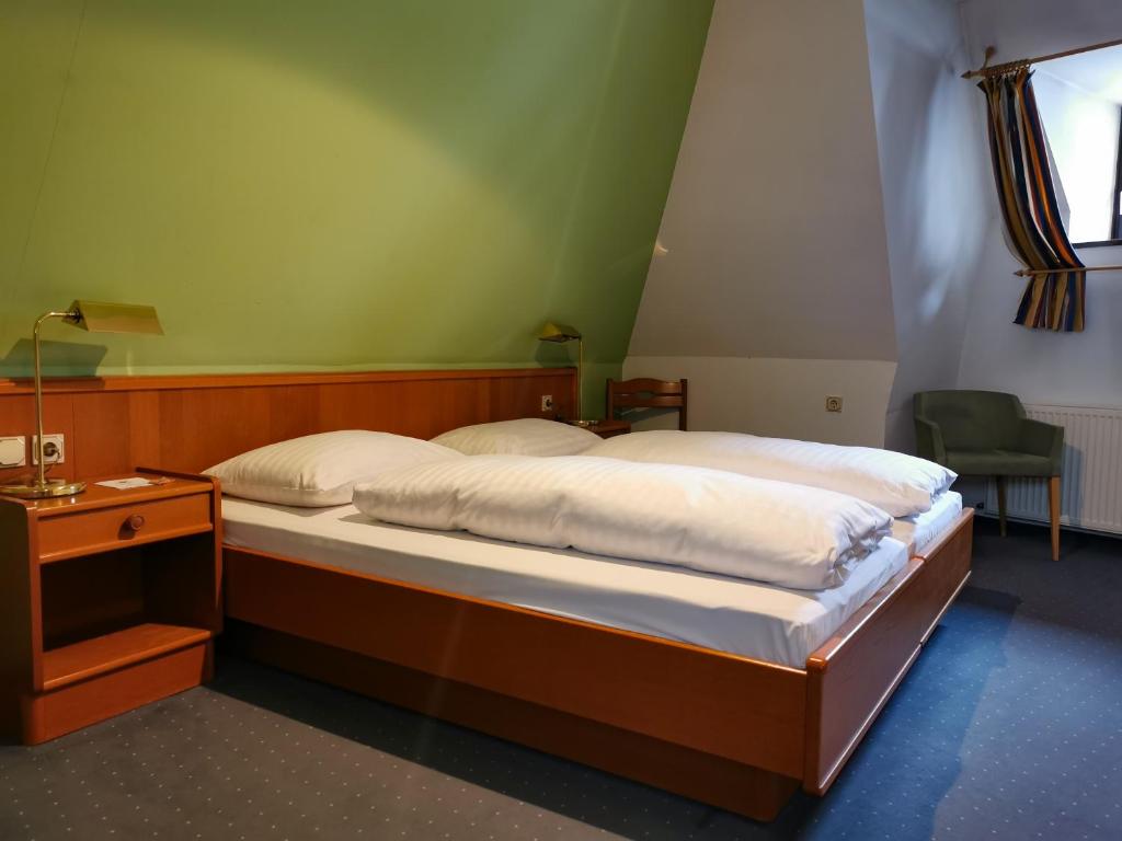 Posteľ alebo postele v izbe v ubytovaní Hotel Kartause