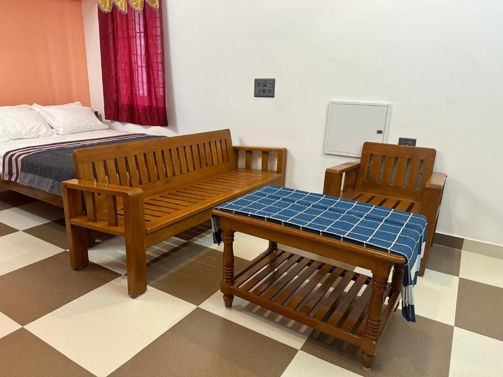 Postel nebo postele na pokoji v ubytování Danshika Temple Residency