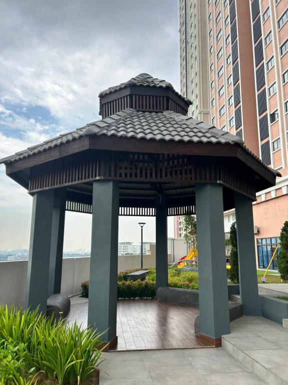 a gazebo in the middle of a city at Homestay Rumah Kita Edusentral Setia Alam in Setia Alam