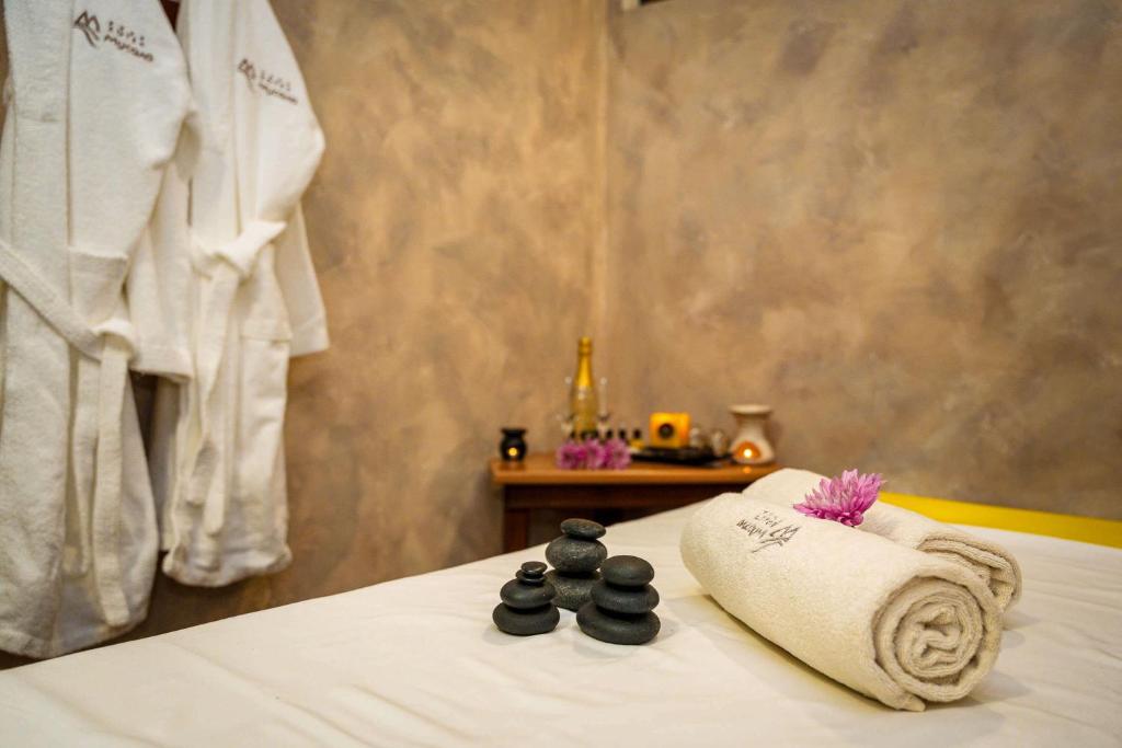 Postel nebo postele na pokoji v ubytování Musala Hotel