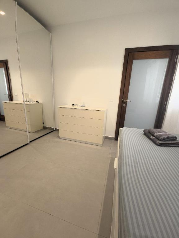 Postel nebo postele na pokoji v ubytování The Msida View apartment