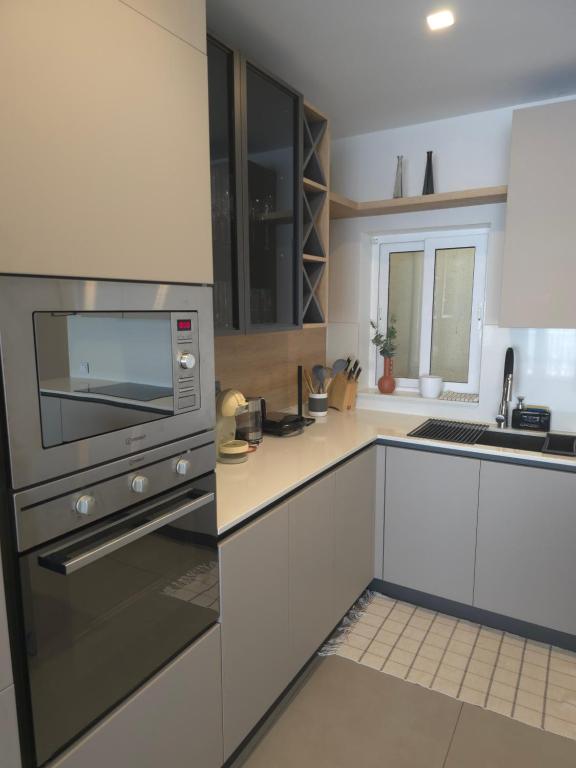 Kuchyň nebo kuchyňský kout v ubytování The Msida View apartment