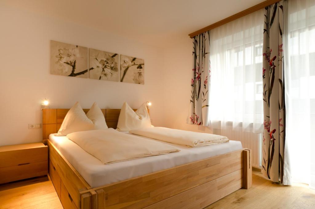 Posteľ alebo postele v izbe v ubytovaní Appartements Hitzenbichler