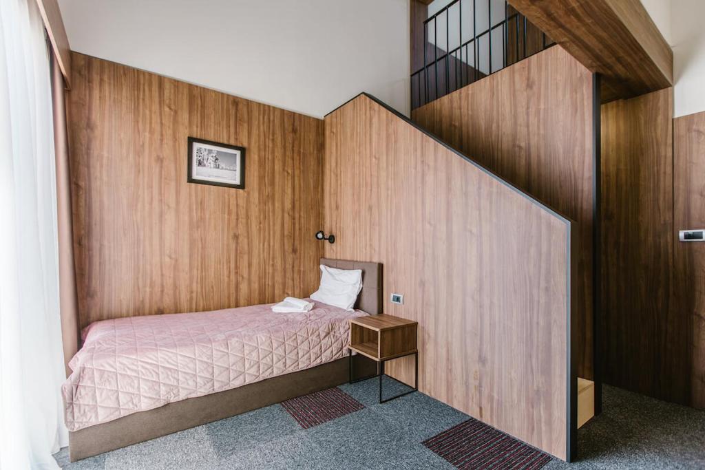 Postel nebo postele na pokoji v ubytování Rtanj Kopaonik Eco Resort & Spa
