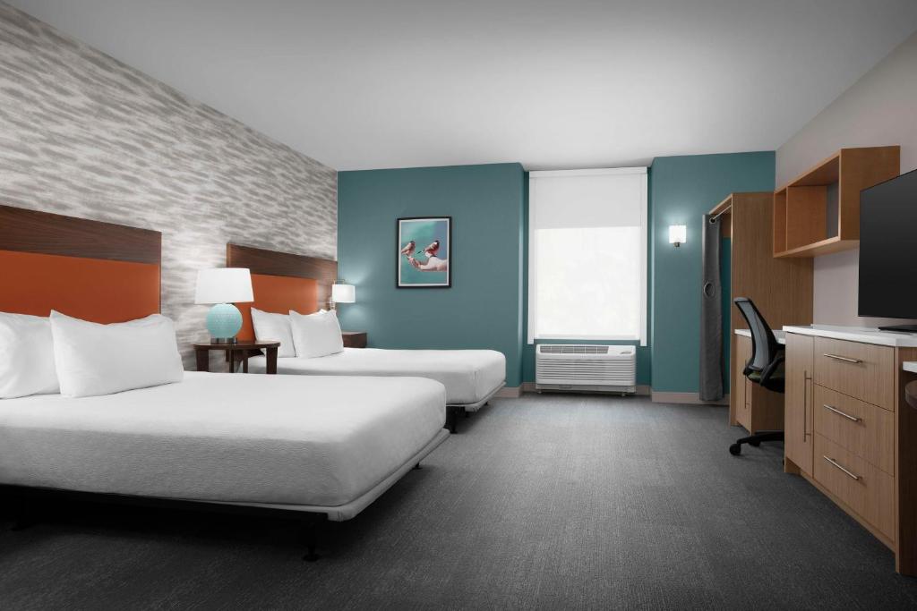 Postel nebo postele na pokoji v ubytování Home2 Suites by Hilton Eugene Downtown University Area