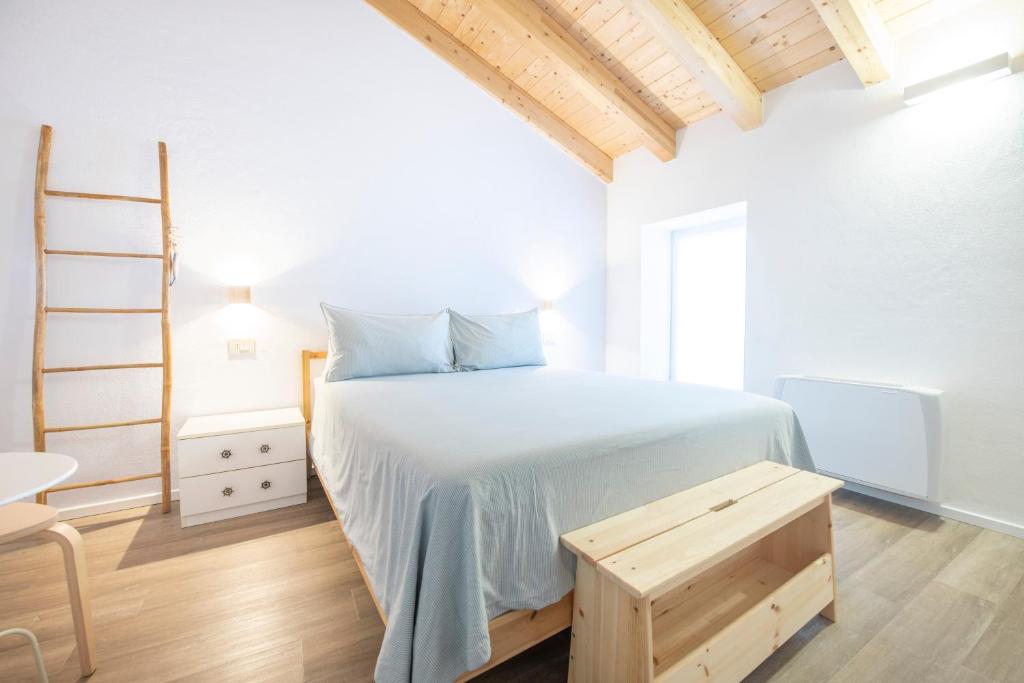 Postel nebo postele na pokoji v ubytování B&B La Volpe