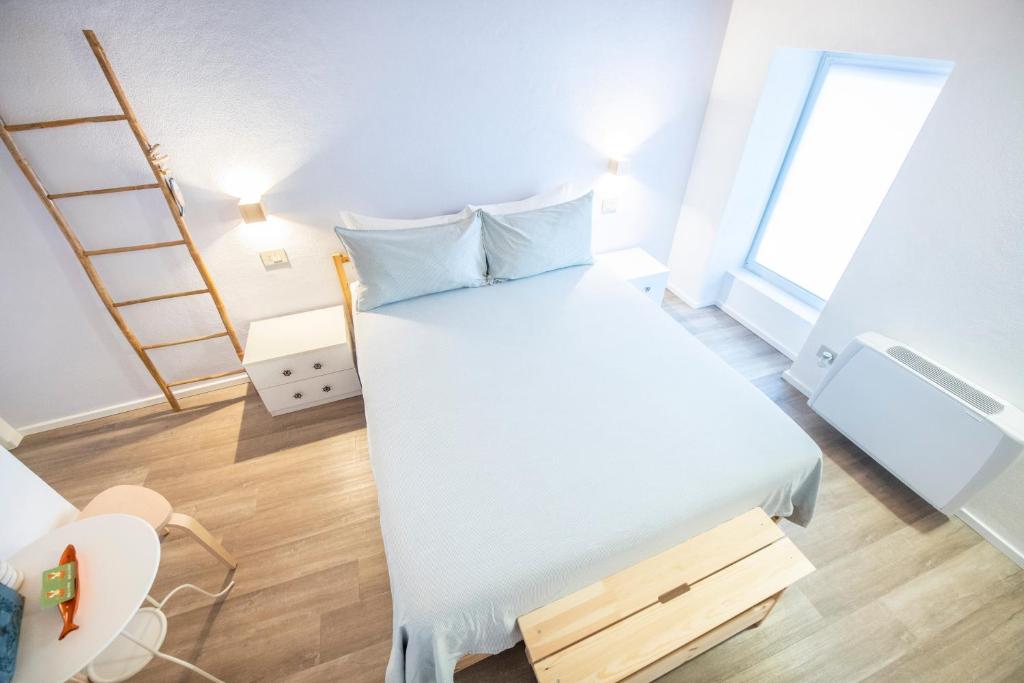 Postel nebo postele na pokoji v ubytování B&B La Volpe