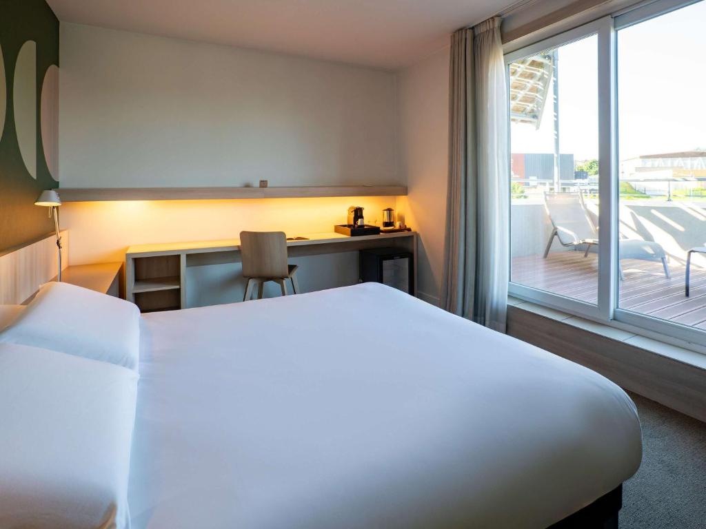 Postel nebo postele na pokoji v ubytování ibis Styles Guéret