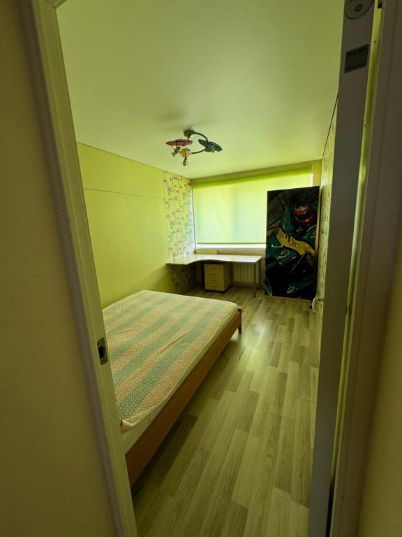 Postel nebo postele na pokoji v ubytování Tallinna mnt