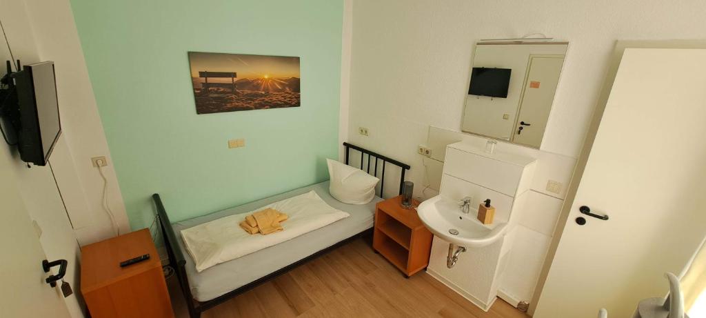 Postel nebo postele na pokoji v ubytování Gästehaus Villa Seraphinum