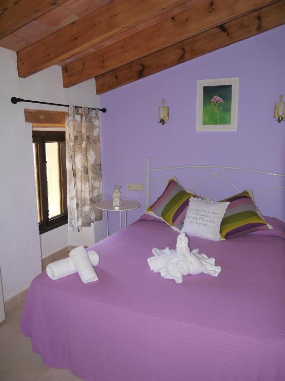 Кровать или кровати в номере Agroturismo Sa Duaia