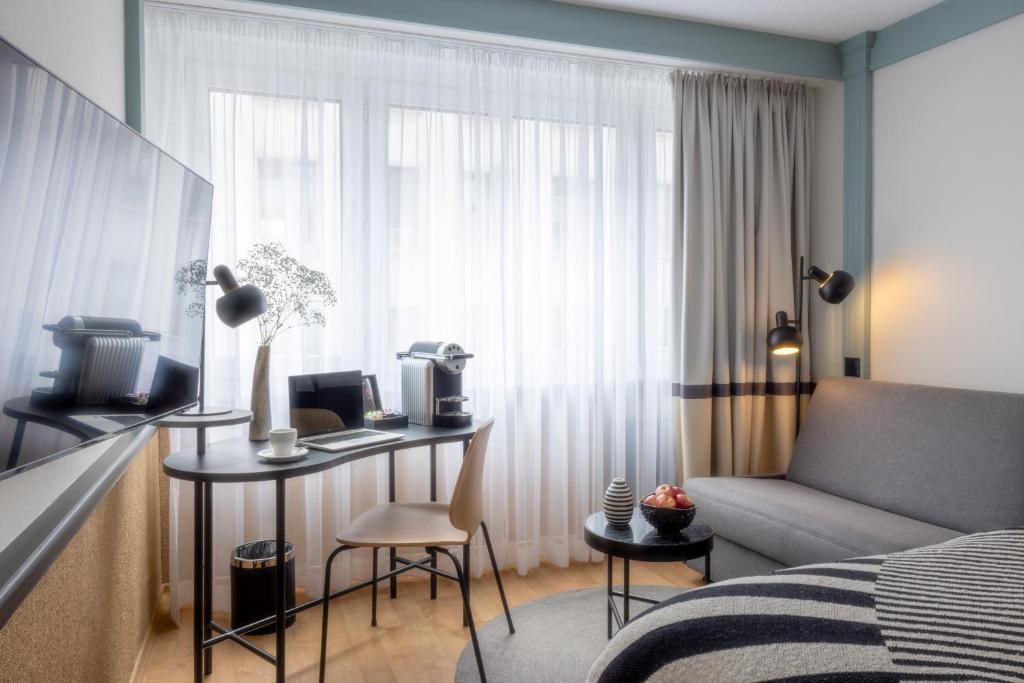 Postel nebo postele na pokoji v ubytování Hotel Luzernerhof