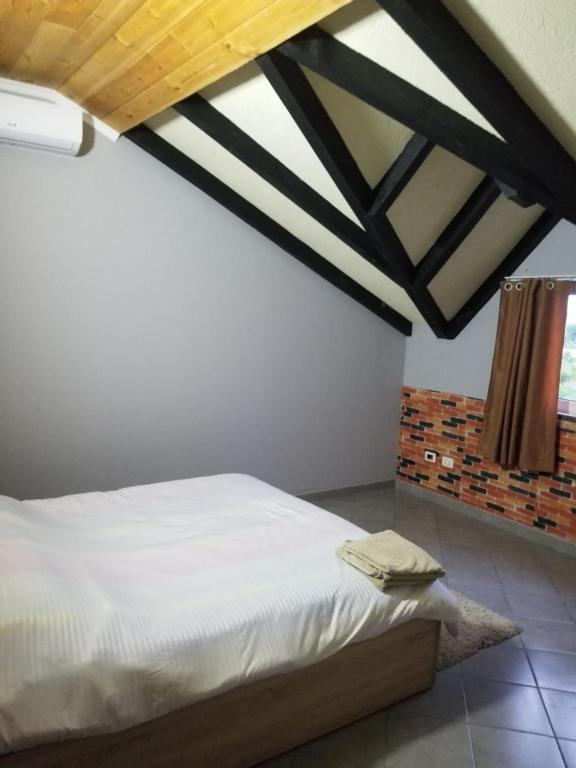 Postel nebo postele na pokoji v ubytování Hotel Culaj
