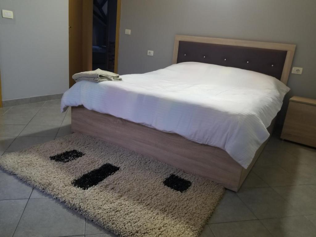 Postel nebo postele na pokoji v ubytování Hotel Culaj