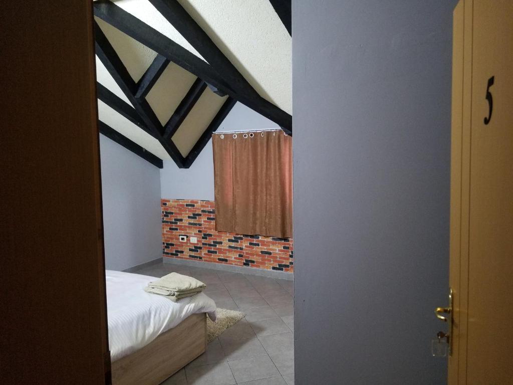 Postel nebo postele na pokoji v ubytování Hotel Culaj