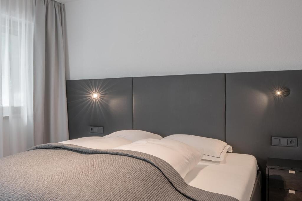 Ein Bett oder Betten in einem Zimmer der Unterkunft Chalet Madlein