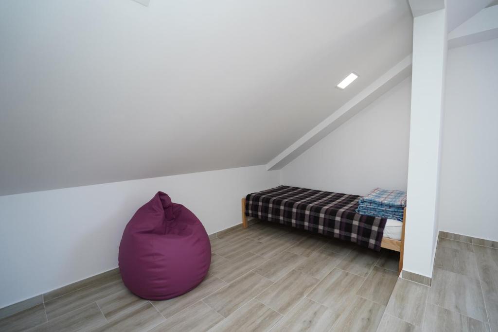 Postel nebo postele na pokoji v ubytování Apartmani Vujović