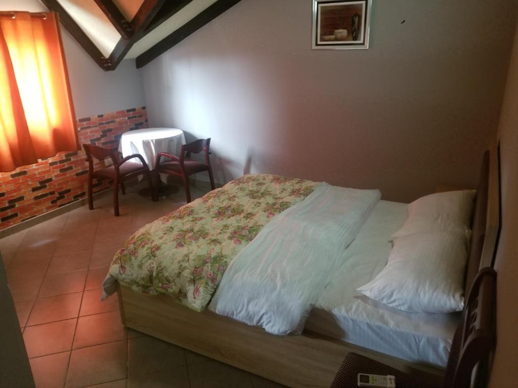 Postel nebo postele na pokoji v ubytování Hotel Culaj
