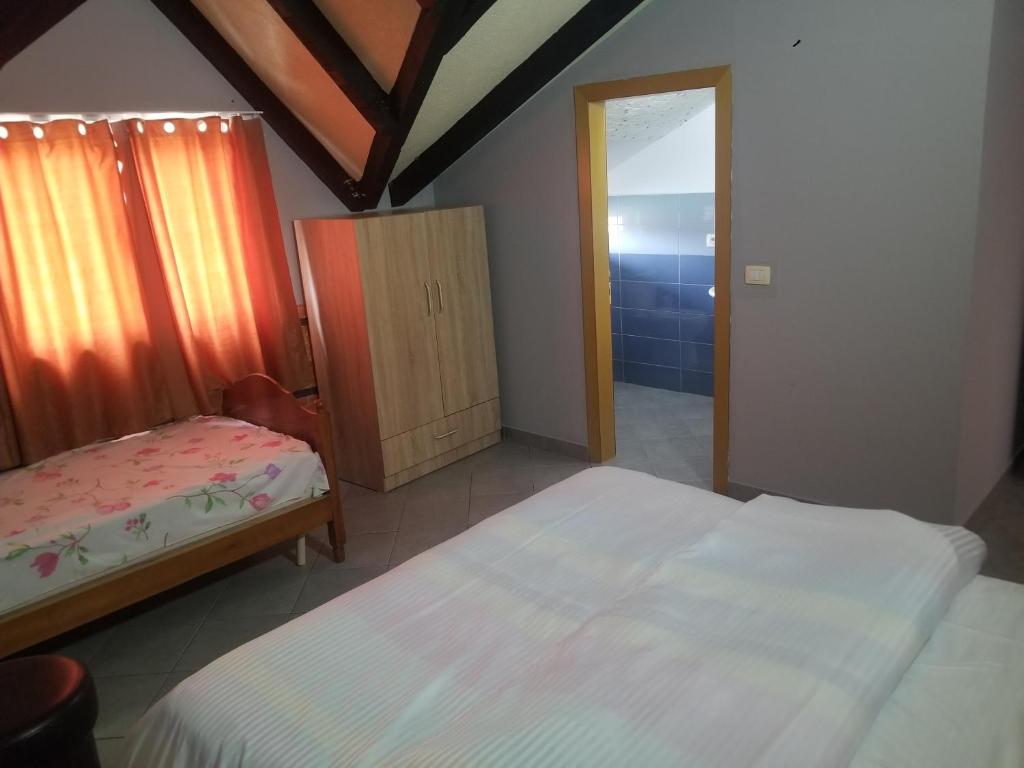 Postel nebo postele na pokoji v ubytování Hotel Culaj