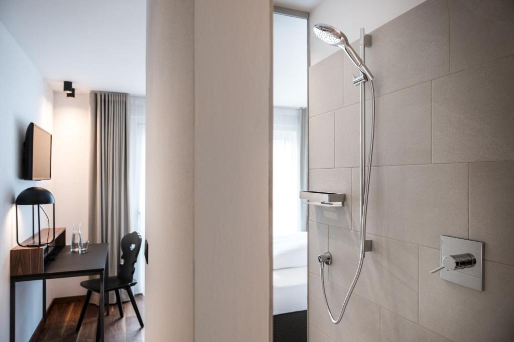 Łazienka w obiekcie Hotel Ciasa Tamá