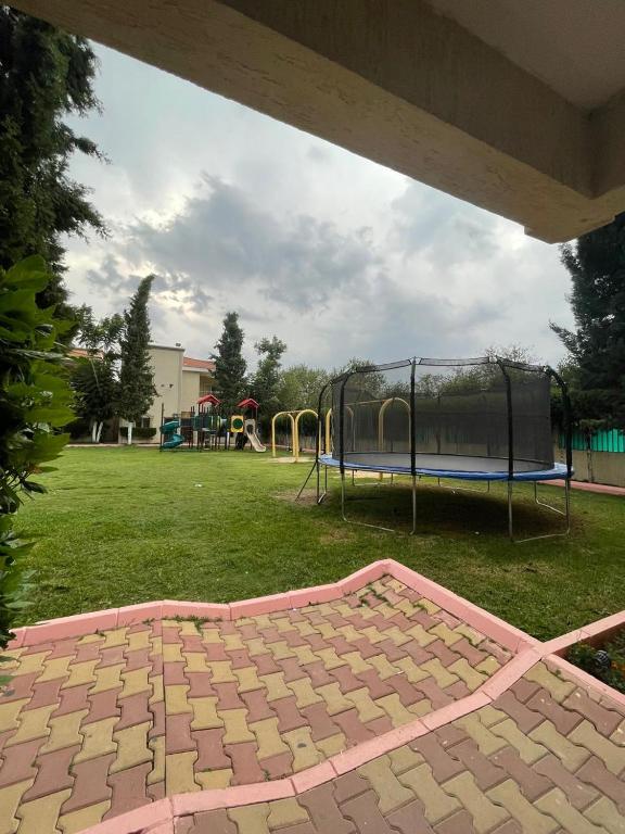 Bazén v ubytování Al Muhaidb Residence for Chalets and Holidays Homes المهيدب ريزدنس لبيوت العطلات nebo v jeho okolí