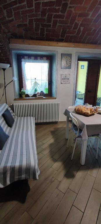 Łóżko lub łóżka w pokoju w obiekcie casa margherita