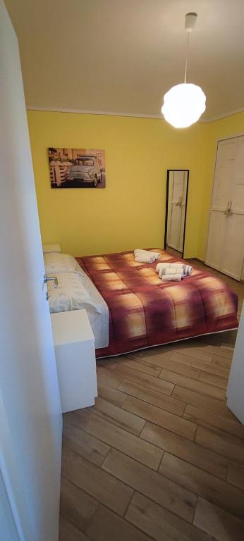 Łóżko lub łóżka w pokoju w obiekcie casa margherita