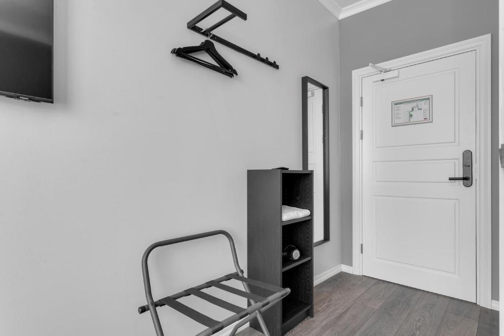 TV a/nebo společenská místnost v ubytování Hotel Aska