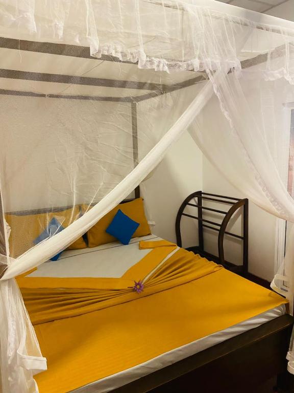 Postel nebo postele na pokoji v ubytování Perfect Home Mirissa