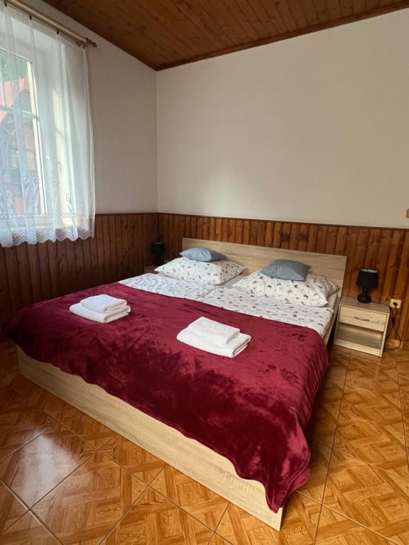 Postel nebo postele na pokoji v ubytování Hřensko 27 Apartmány