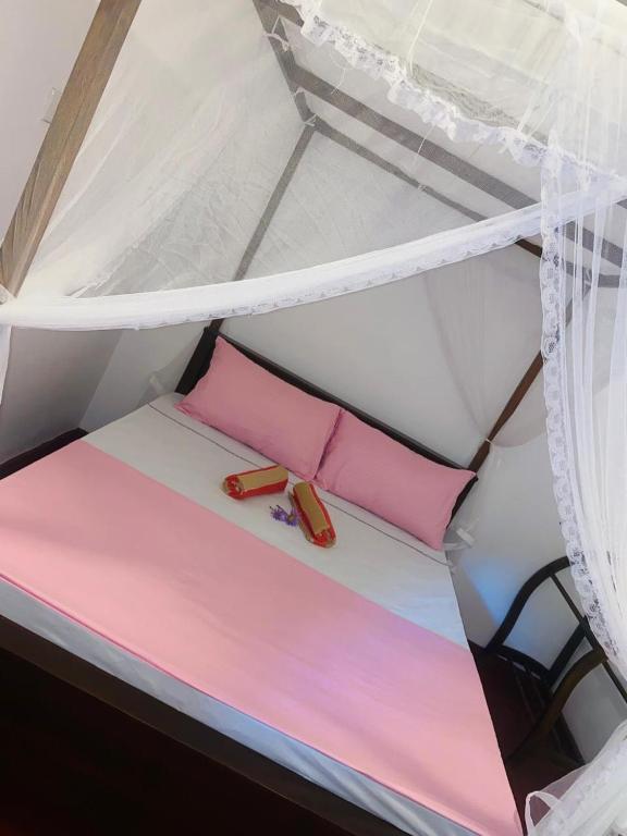 Postel nebo postele na pokoji v ubytování Perfect Home Mirissa