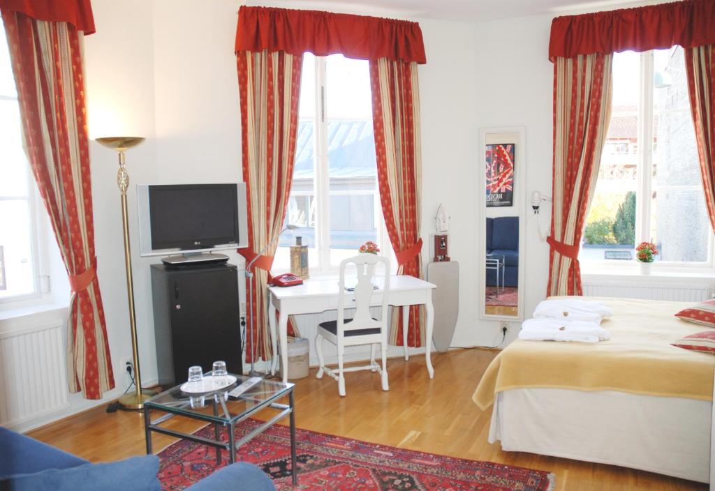 Postel nebo postele na pokoji v ubytování Hotel Concordia