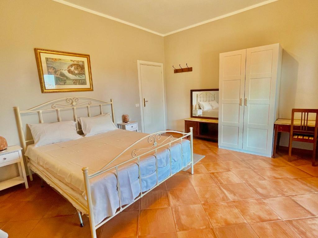 Postel nebo postele na pokoji v ubytování B&B Terre Toscane